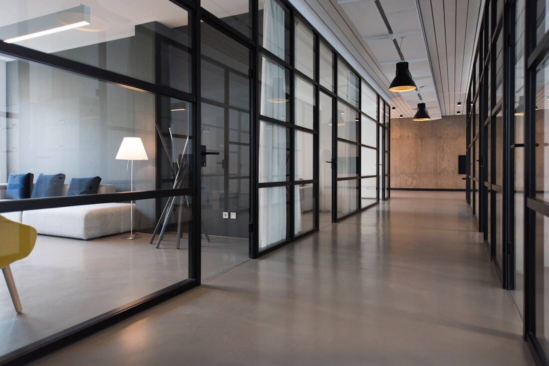 Premium commercial office tenant improvement space with open work areas and coordinated building systems